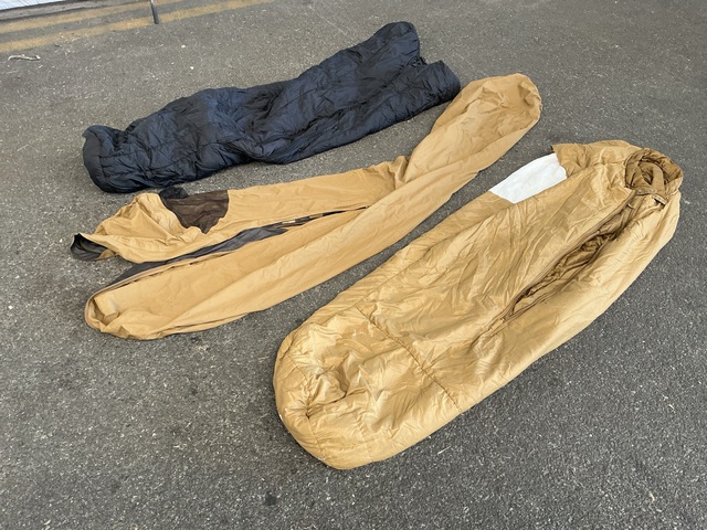 (15) Duffel Bags, (15) Sleeping Bags, (16) Stuff Sacks & (6) Bivy Covers