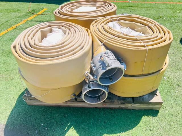 Quantity of (6) 6 in x 50 ft Lay Flat Fuel/Water Hose w/ Camlock Fittings (Unused)