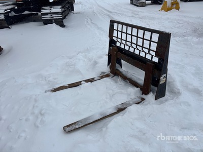 Cat 46 in Skid Steer Forks