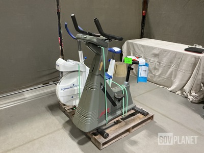 (1) Monark Ergomedic 828 E Exercise Bike & (1) Life Fitness 9500HR Exercise Bike