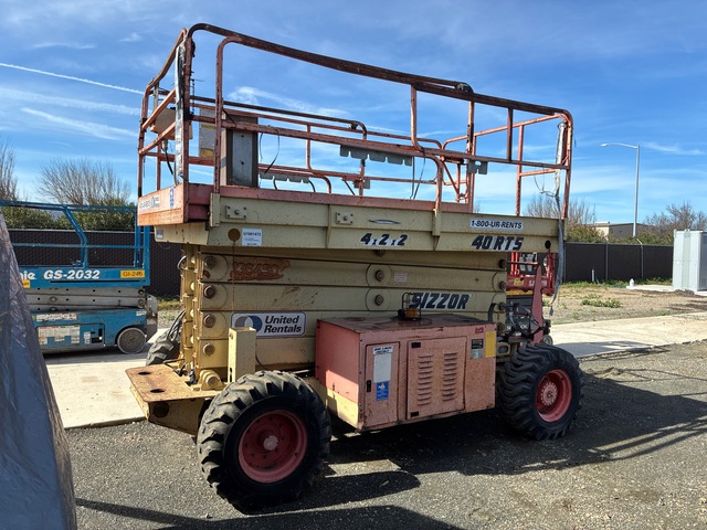 1999 JLG 40RTS Dual Fuel Scissor Lift (Inoperable)