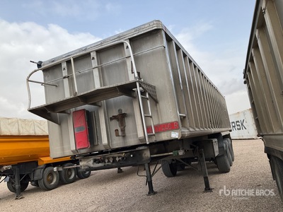 1996 Montenegro SCHB 3SA Tri/A Aluminum End Dump Trailer