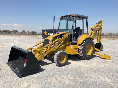2001 New Holland 555E Retroexcavadora / Chargeuse-pelleteuse