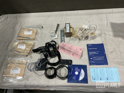 (1) Digital Still Camera, (16) Lamp Ballasts & Assorted Items