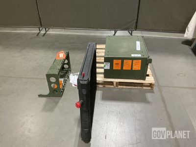 (1) Accessories Stowage Box, (1) Engine Coolant Radiator & Assorted Items