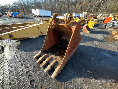 Cat 48 in Excavator Bucket
