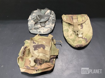 (61) Entrenching Carriers, (77) Canteens, (7) Entrenching Tools & Assorted Items