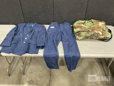 (1) Flyer’s Helmet Bag, (37) Pairs of Men’s Trousers & Assorted Items