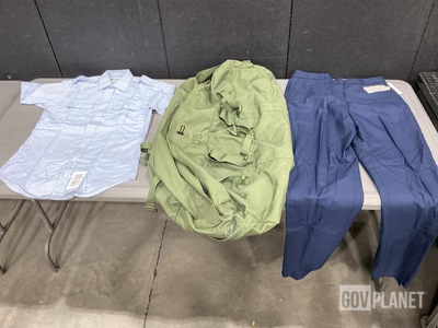 (2) Pairs of Women’s Slacks, (9) Duffel Bags & Assorted Items