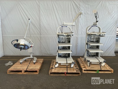 (1) Berchtold D540 Surgical Light & (2) Olympus WM-NP2 Mobile Workstations
