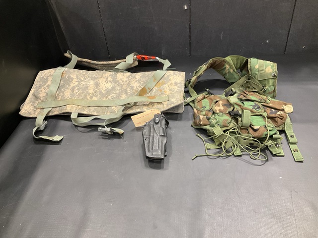 (1) Spare Barrel Bag, (30) Individual Holsters & Assorted Items