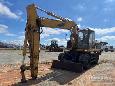 2000 Cat M318 Pelles sur Pneus