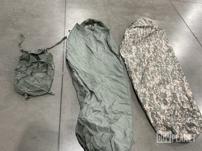 (22) Compression Stuff Sacks, (72) Sleeping Bags & Assorted Items