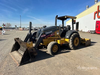 2015 John Deere 210K Pala gommata per cura del verde