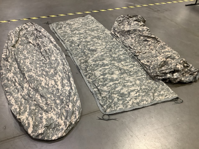 (18) Bivy Covers, (25) Wet Weather Poncho Liners & Assorted Items