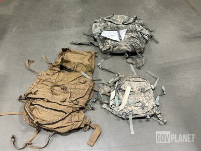 (9) Field Pack Frame Assemblies, (4) Field Packs & Assorted Items