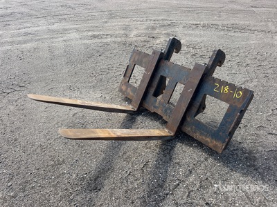 Cat 48 in Backhoe Forks