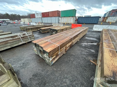 Quantity of (12) 8 in x 12 in x 10 -12 ft Pressure Treated Lumber