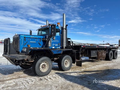 2003 Kenworth C550 8x6 Twin-Steer Bed Truck