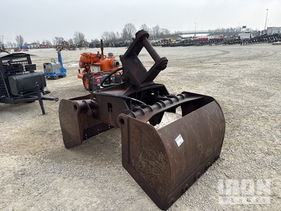 Benne à secteurs ouvrants