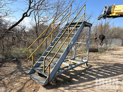 8'6" high platform steps on rollers. Ladder