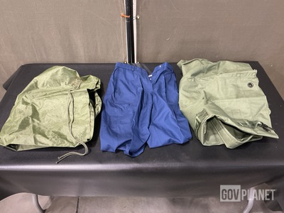 (65) Duffel Bags, (6) Pairs of Women's Slacks & Assorted Items