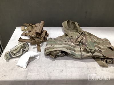 (1) Vest, (22) Assorted Holsters, (63) Pairs of Goggles & Assorted Items