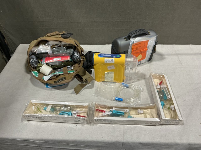 (2) Combat Casualty Response Kits, (1) Compact Suction Unit & Assorted Items (2) Combat Casualty Response Kits, (1) Compact Suction Unit & Assorted Items