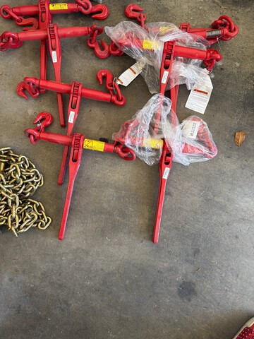 Quantity of Binders, Chains, Coil Racks, Straps, Protectors, Bungees, and Tarp for Hauling