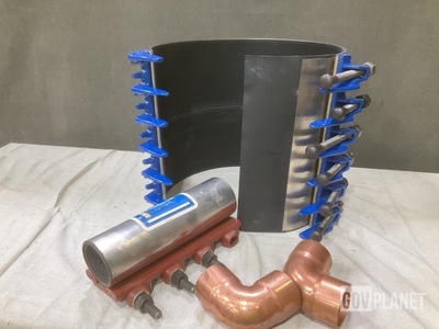 (4) Clamp Couplings, (11) Tube Elbows, (1) Coupling & Assorted Items