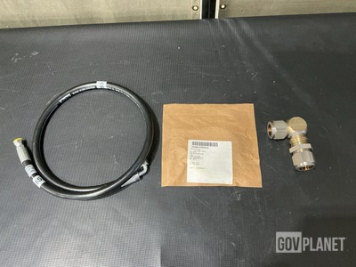 (8) Retainers, (32) Hose Assemblies, (1) Valve Assembly & Assorted Items