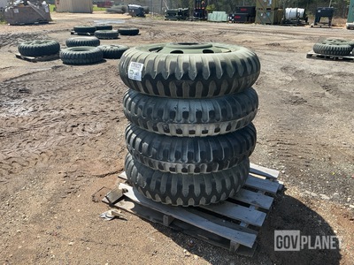 (4) STA 9.00-20 Tires w/Wheels