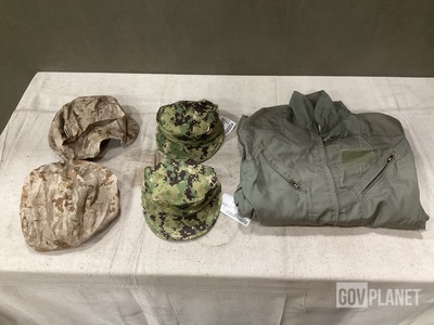 (5) Pairs of Flyer’s Coveralls, (100) Service Caps & Assorted Items