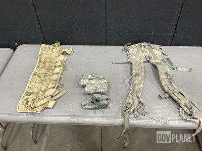 (10) Frame Shoulder Straps, (25) Pistol Holster Carriers & Assorted Items