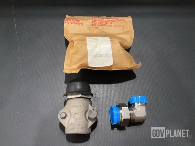 (2) Adapters, (2) Tube Elbows, (1) Coupling Half & Assorted Items
