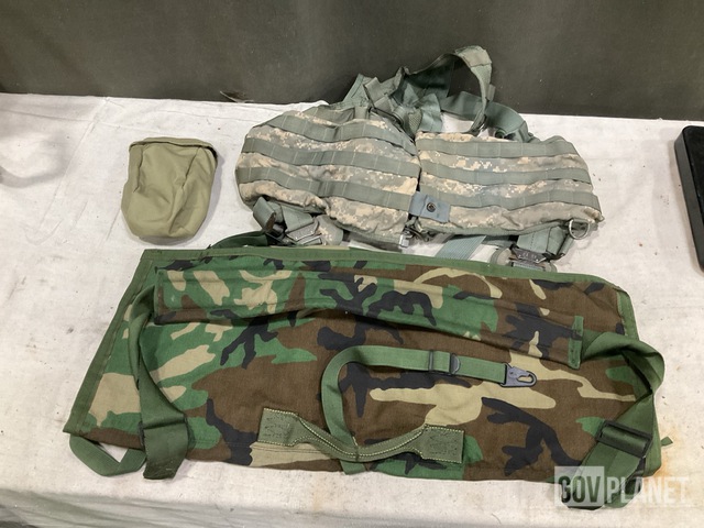 (24) Pairs of Industrial Goggles, (9) Machine Gun Barrel Cases & Assorted Items