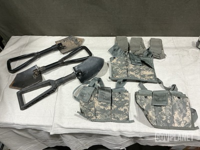 (29) Entrenching Tools, (23) Bandoleer Ammunition Pouches & Assorted Items