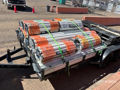 Quantity of (16) 8 Ft Garage Doors (Unused)