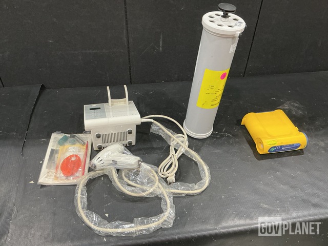 (2) Compact Suction Units, (4) Calibration Syringes & Assorted Items