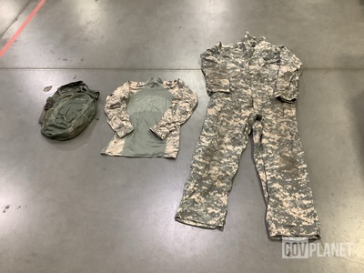 (7) Mechanic's Coveralls, (5) Battle Shirts & Assorted Items