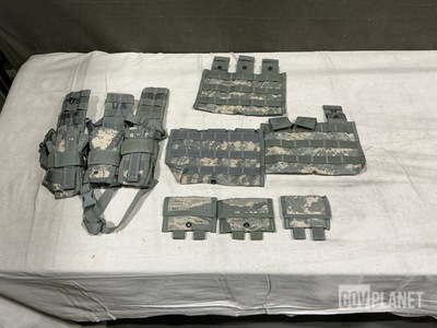 (31) Pistol Holster Carriers, (113) M4 Three Mag Pouches & Assorted Items
