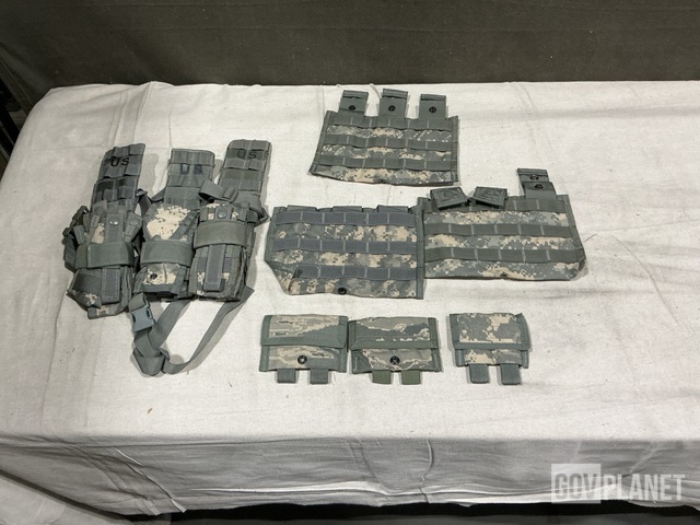 (31) Pistol Holster Carriers, (113) M4 Three Mag Pouches & Assorted Items