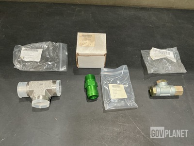 (4) Pipe Tees, (12) Check Valves, (27) Coupling Halves & Assorted Items