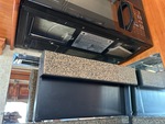Interior with Stove Hood Exhaust Fan and Vent Cover