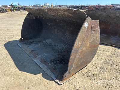 Cat 114 in Backhoe Loader Bucket