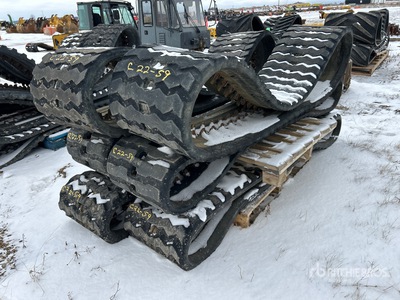 Quantity of (6) John Deere Skid Steer Tracks