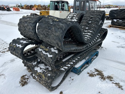 Quantity of (6) John Deere Skid Steer Tracks