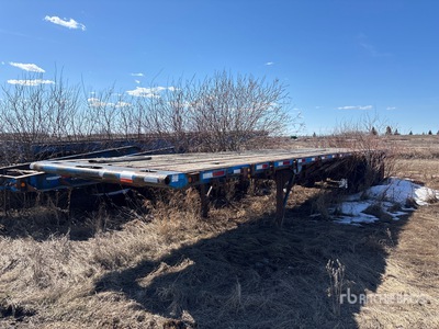 1989 Univision M 46 ft Tri/A Flatbed Trailer