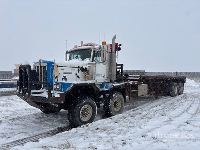 2002 Kenworth C500B 8x4 Twin-Steer Bed Truck