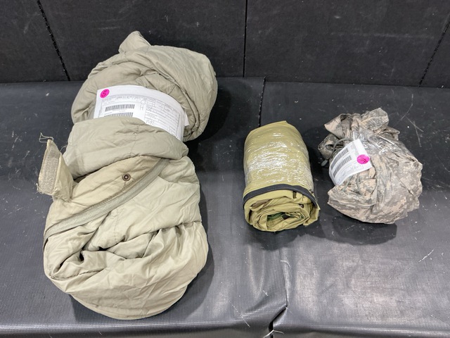 (29) Wet Weather Ponchos, (11) Bivy Covers, (39) Sleeping Bags & Assorted Items